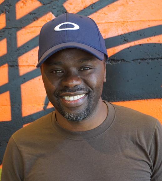 A portrait photo of Sam Irungu