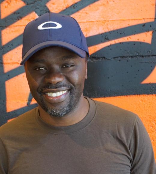 A portrait photo of Sam Irungu