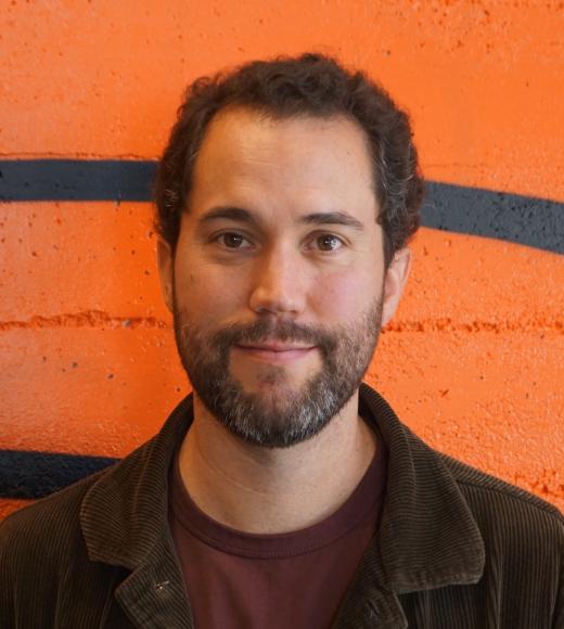 A portrait photo of Andy Holguin